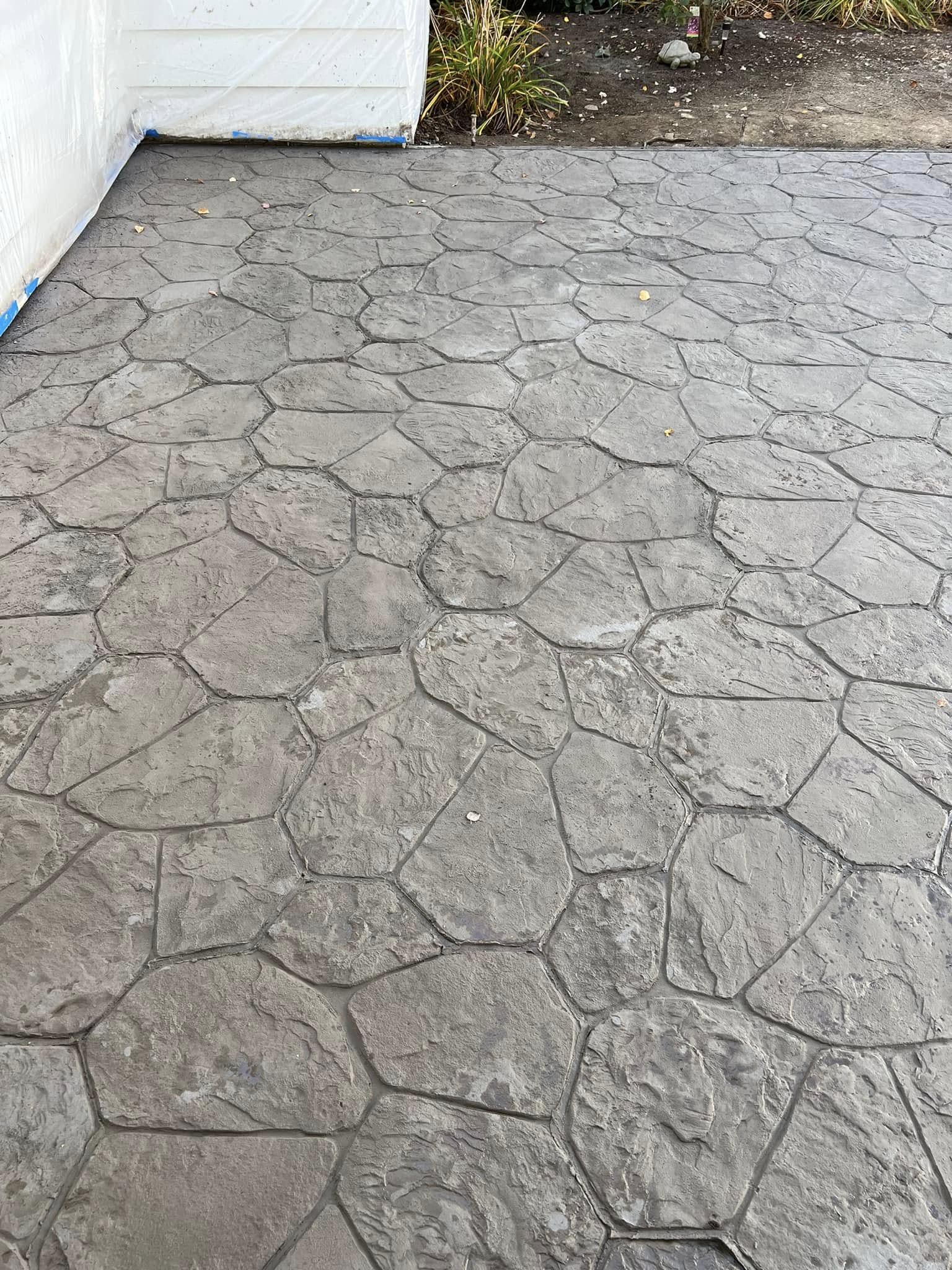 Close-up of a stamped stone-pattern concrete patio